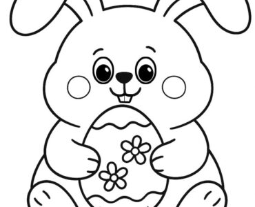 rabbit holding egg