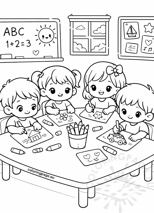 children drawing at a table
